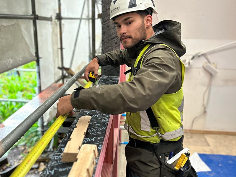 Cassidy team member measuring on site