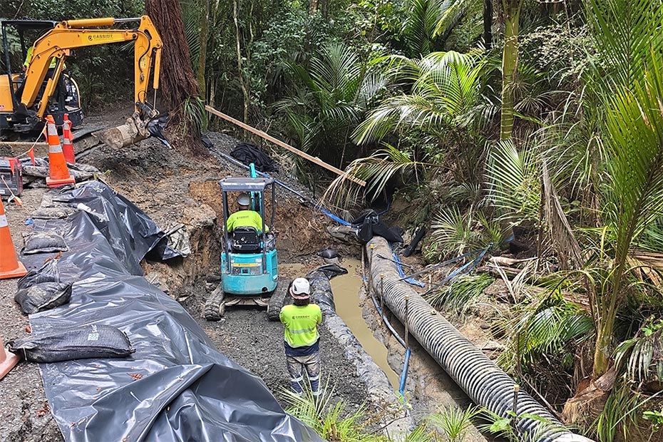 Lynn Reserve works to shore up the bank and protect the new wastewater pipe