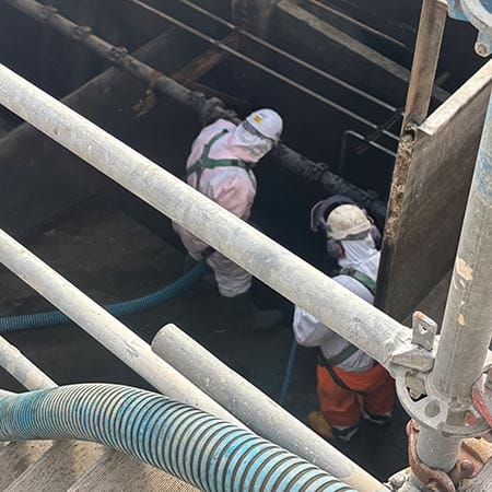 Cassidy team at work inside one of the primary sedimentation tanks