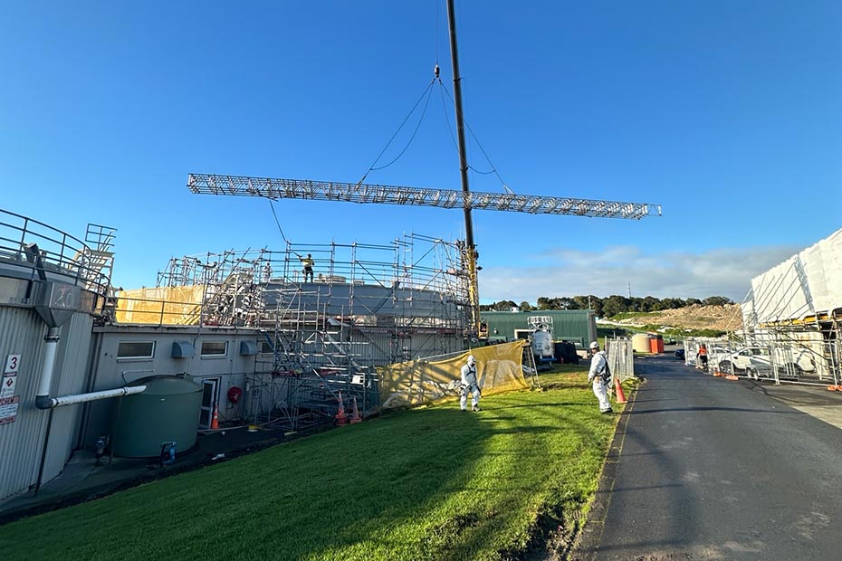 crane lifting steel structure into position