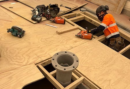 cassidy team member working on timber roof structure at rosedale digester 4