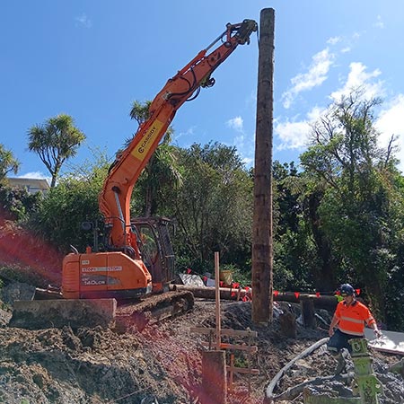 lifting piles into place at city view terrace cassidy construction